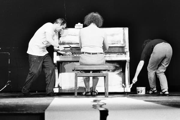 Ben Vautier, Philip Corner and Ann Noël performing Piano Piece #1 & #2 by George Maciunas (Photo: Berty Skuber, 1985)
